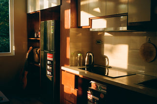 A kitchen with a window and a sink